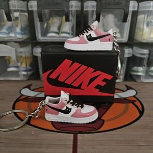 Nike Air Force 1 pair of mini sneakers keychain.